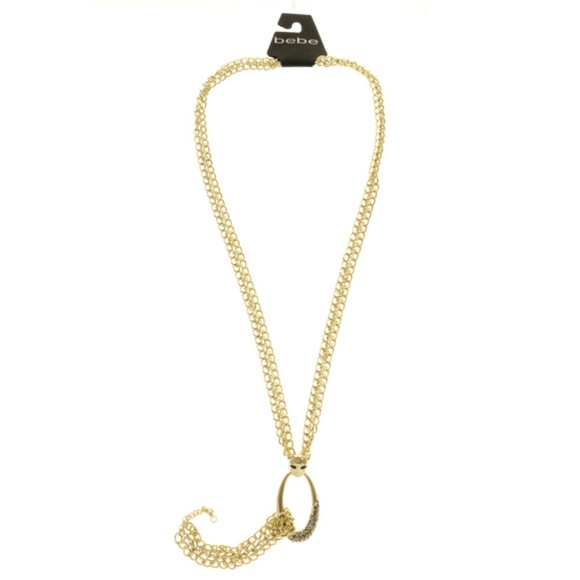 bebe Jewelry - Gold Bebe necklace with oval "cat" pendant